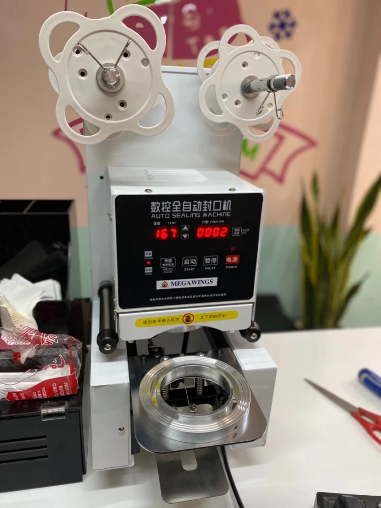 Máy dập nắp cốc tự động Megawings